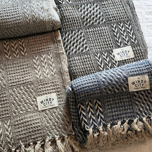 Simple and luxurious, the Comfort Classic blanket from India is handcrafted from 100% natural cotton, offering ultimate softness and plush comfort. Featuring a stylish chevron pattern, it provides an exquisite aesthetic that complements any décor. Its generous 70” x 50” size and lightweight design offer both comfort and convenience. 