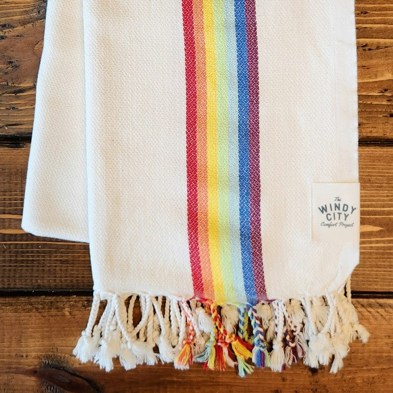 Summer Turkish Blanket - Tan/Rainbow-Our popular Turkish Blankets are back and even better this year! Now crafted by a family business in Turkey from 100% OEKO-TEX certified organic cotton, and slightly bigger at 72" x 38", this Turkish Towel is ready for all your spring and summer activities! Perfect to use as a blanket, shawl, wrap, scarf, throw, tablecloth, picnic blanket, bath towel... the options are endless! The tightly weaved cotton makes them sand-repellent and quick drying - the ideal blanket to ta