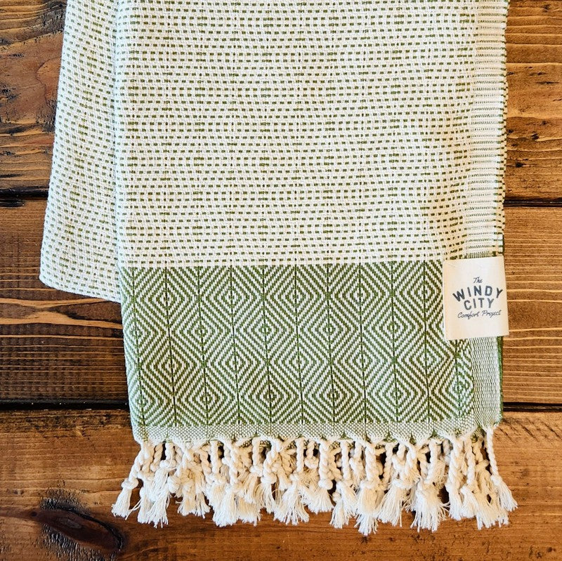 Summer Turkish Blanket - Olive-Our popular Turkish Blankets are back and even better this year! Now crafted by a family business in Turkey from 100% OEKO-TEX certified organic cotton, and slightly bigger at 72" x 38", this Turkish Towel is ready for all your spring and summer activities! Perfect to use as a blanket, shawl, wrap, scarf, throw, tablecloth, picnic blanket, bath towel... the options are endless! The tightly weaved cotton makes them sand-repellent and quick drying - the ideal blanket to take to 