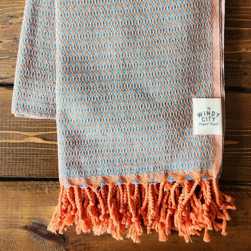 Our popular Turkish Blankets are back and even better this year! Now crafted by a family business in Turkey from 100% OEKO-TEX certified organic cotton, and slightly bigger at 72" x 38", this Turkish Towel is ready for all your spring and summer activities!&nbsp;